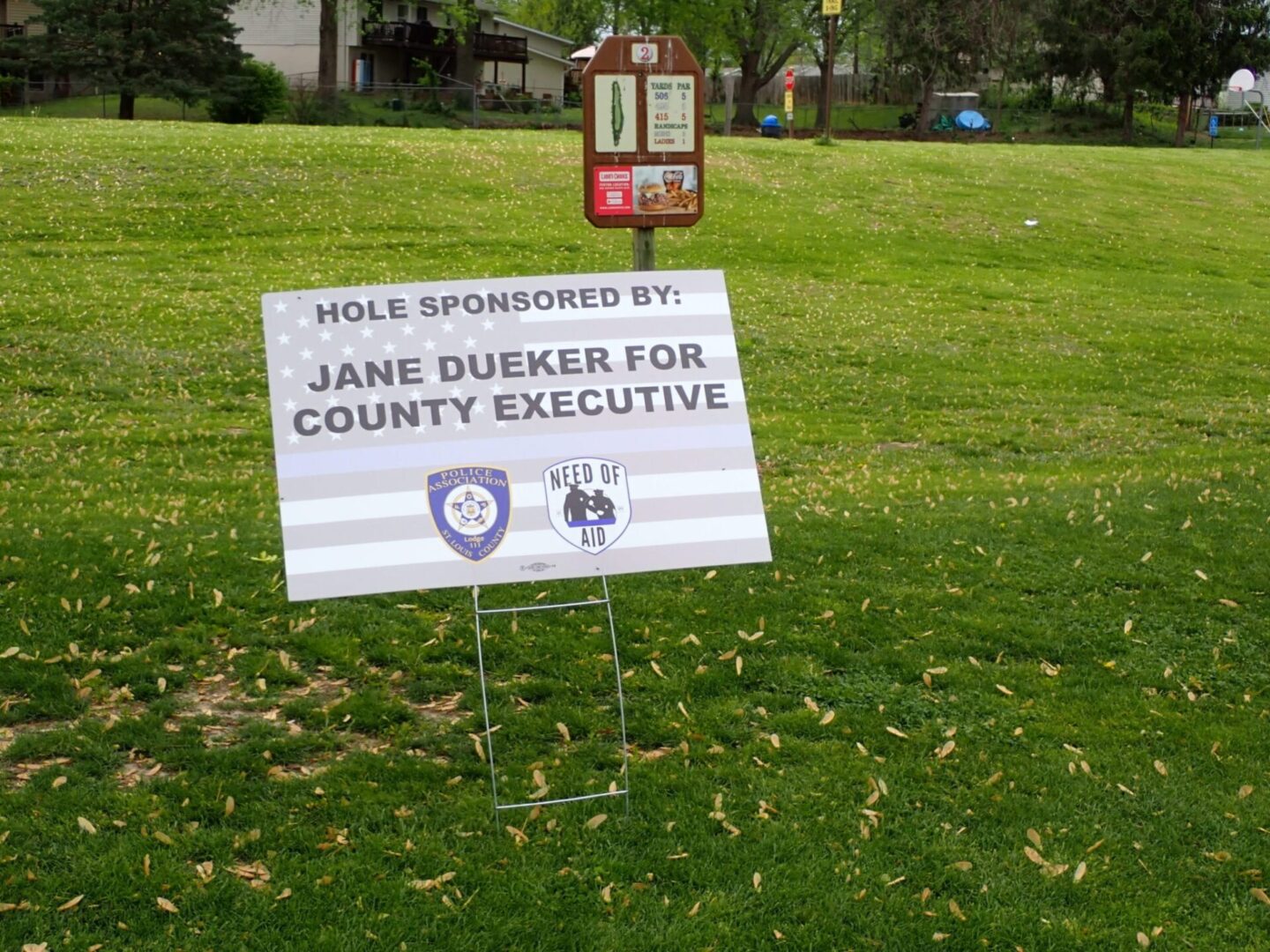 A yard sign supporting Jane Dueker for County Executive.