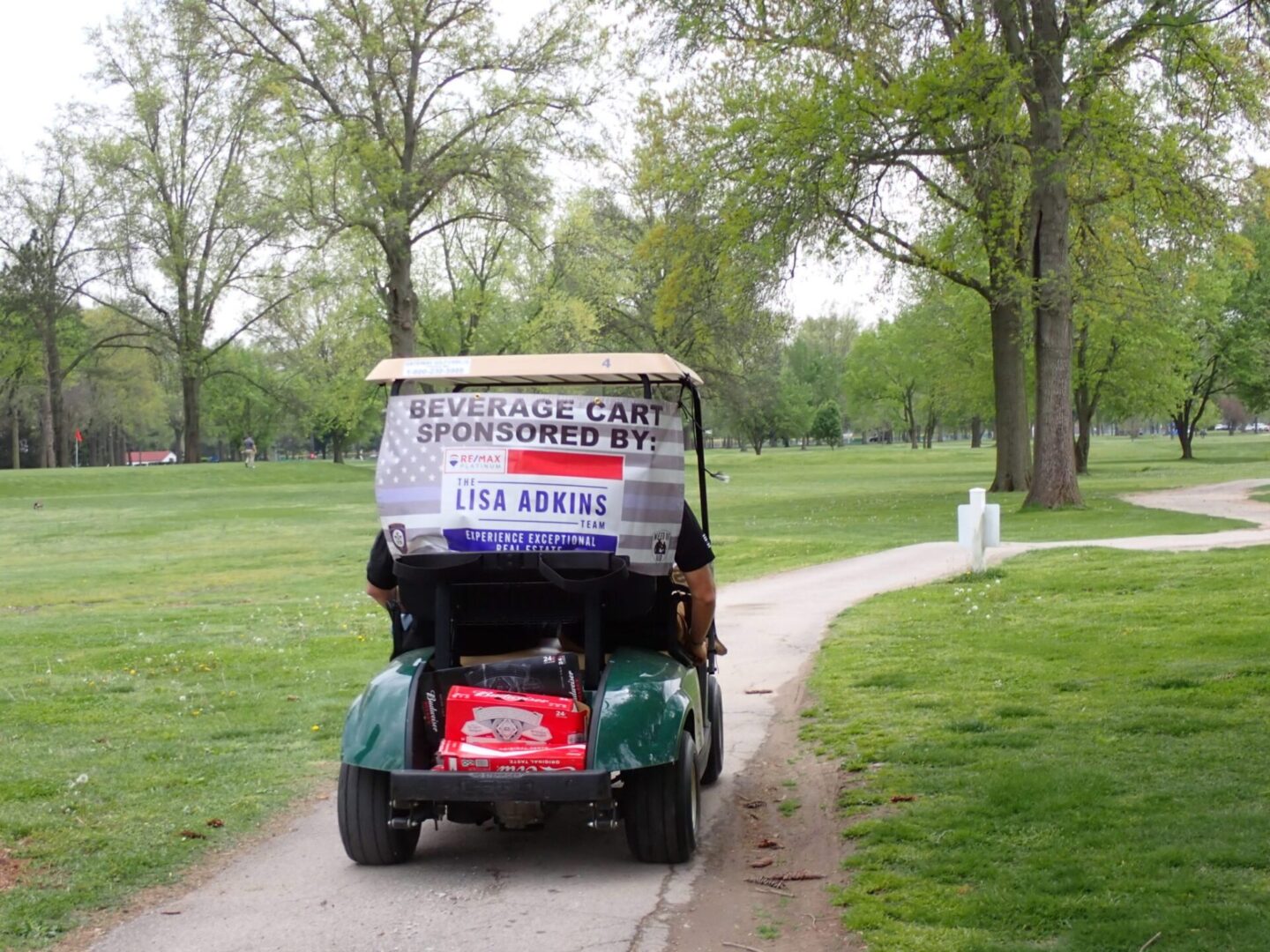 Golf cart with a sign protesting against COVID-19 mandates.